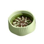 Matcha green slow feeder cat bowl filled with kibble, maze inserts visible