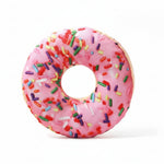 Pink donut plush dog toy with sprinkles, shown with dimensions