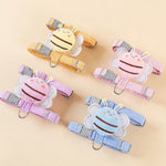 Set of cartoon monkey-themed dog collars on a beige background