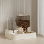 Pet feeding and water station with wooden blocks and a transparent container on a neutral background.