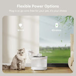 Cat next to a pet water fountain with 'Wired' and 'Wireless' options displayed.